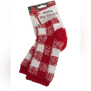 Airplus Holiday Aloe Infused Spa Crew Socks in a red and white checked pattern